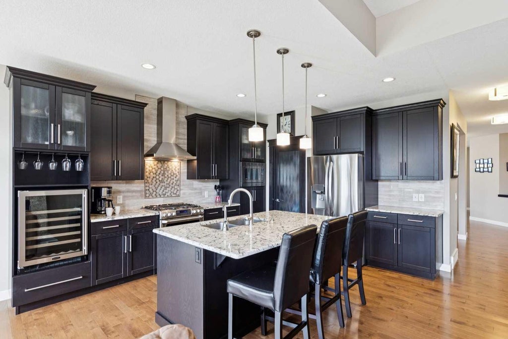 Photo of 27 Ridge View Place, Cochrane, AB T4C 0P8 (MLS # A2323070)