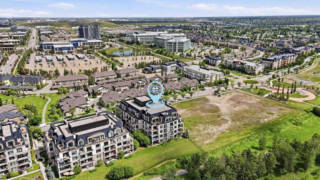 Photo of 221 Quarry Way SE #105, Calgary, AB T2C 5G4 (MLS # A2324318)
