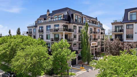 Photo of 221 Quarry Way SE #105, Calgary, AB T2C 5G4 (MLS # A2324318)