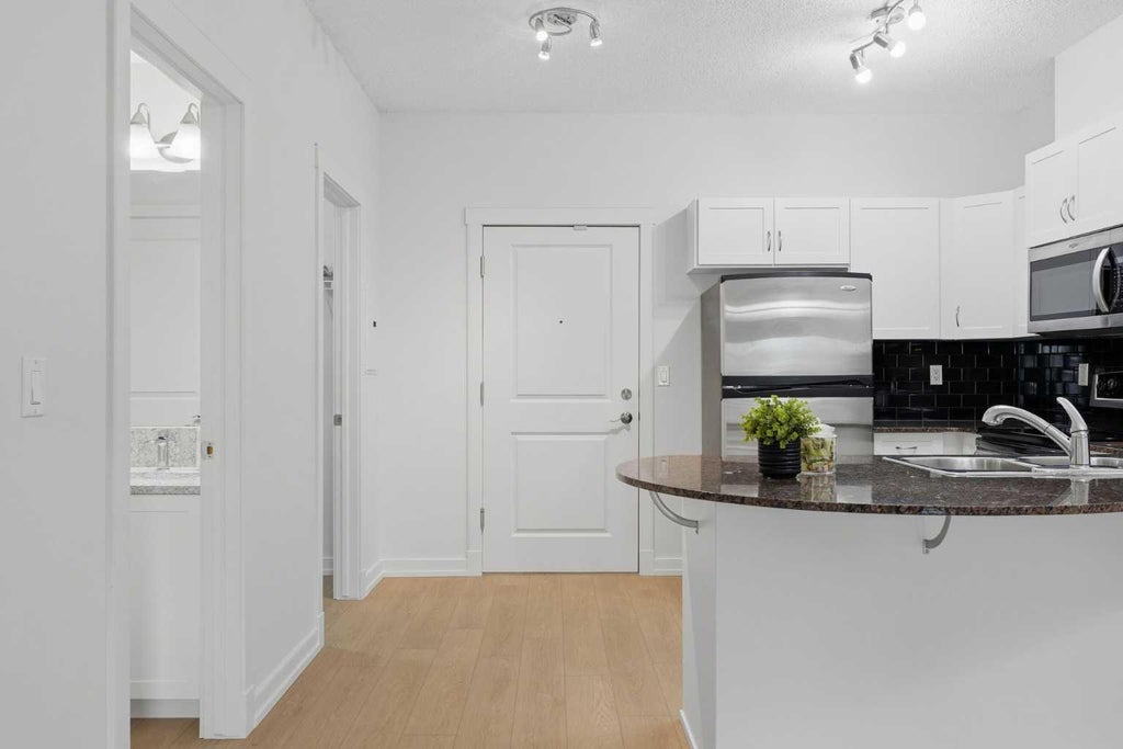 Photo of 11811 Lake Fraser Drive SE #3610, Calgary, AB T2J 7J1 (MLS # A2348139)