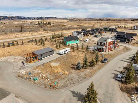 Photo of 130 Cottageclub Court, Rural Rocky View County, AB T4C 1B1 (MLS # A2335358)