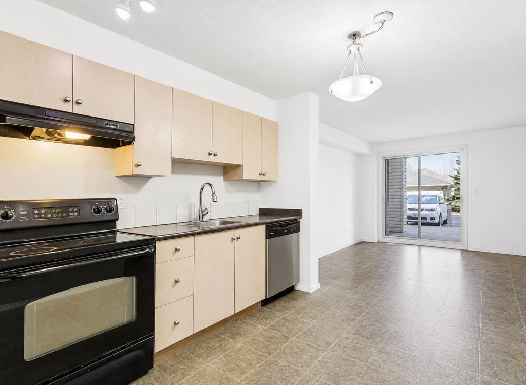 Photo of 2395 Eversyde Avenue SW #1128, Calgary, AB T2Y 0B5 (MLS # A2312397)