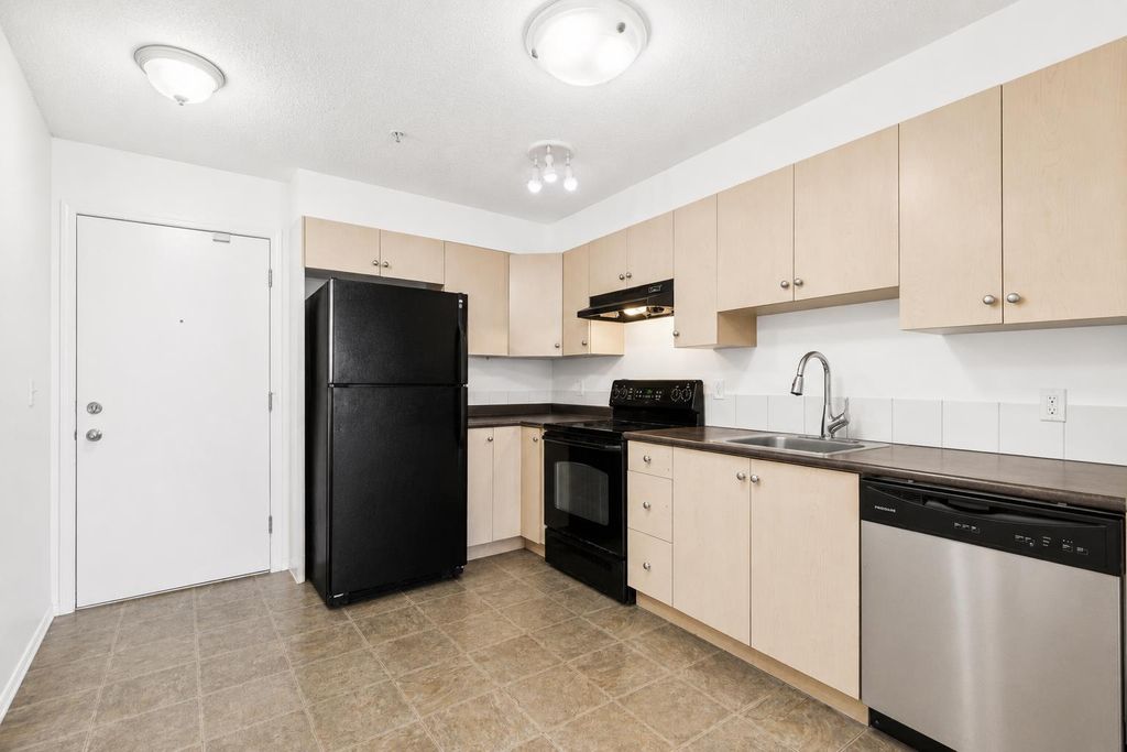 Photo of 2395 Eversyde Avenue SW #1128, Calgary, AB T2Y 0B5 (MLS # A2312397)