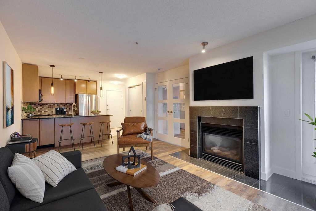 Photo of 35 Richard Court SW #106, Calgary, AB T3E 7N9 (MLS # A2275483)