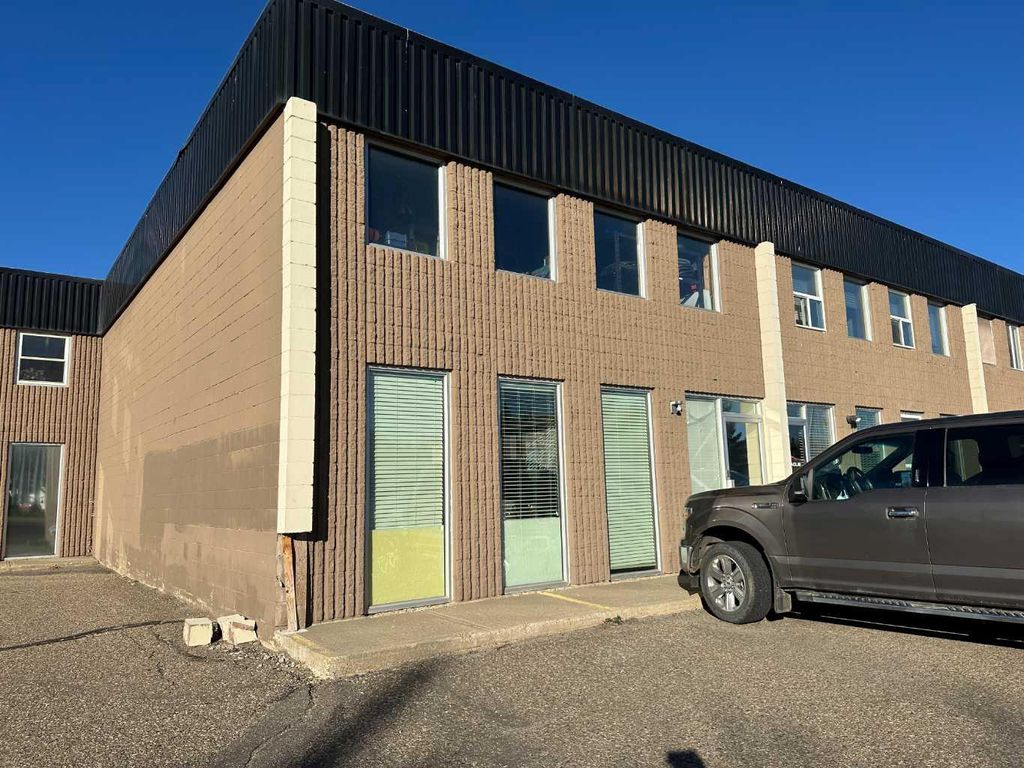 Photo of 311 9 Street E # 2, Brooks, AB T1R 0K2 (MLS # A2266525)