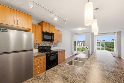 Photo of 700 Willowbrook Road NW #2323, Airdrie, AB T4B 0L5 (MLS # A2345108)
