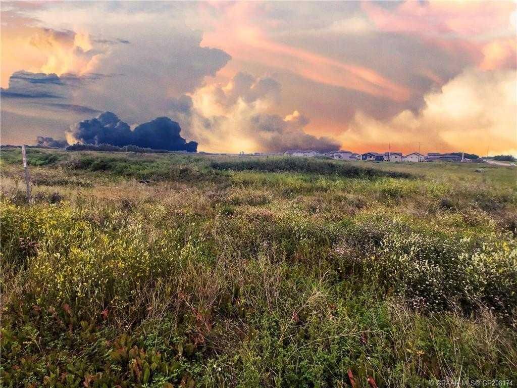 Photo of 8401 92 Street, Grande Prairie, AB T8X 0C4 (MLS # A2092115)