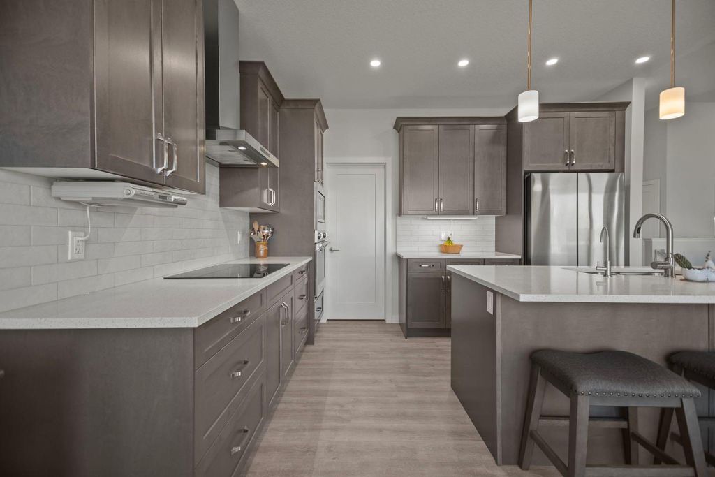 Photo of 4 Cimarron Estates Gardens, Okotoks, AB T1S 0R2 (MLS # A2289641)