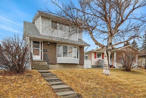 Photo of 103 Macewan Drive NW, Calgary, AB T3K 2G2 (MLS # A2313813)