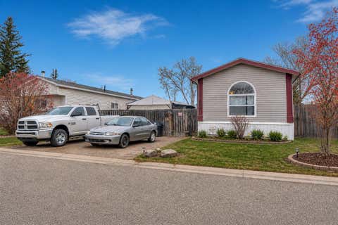 Photo of 863 Brentwood Crescent, Strathmore, AB T1P 1E5 (MLS # A2307818)