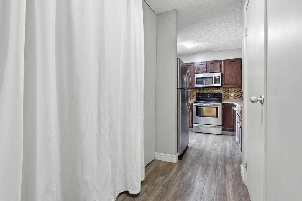 Photo of 145 Point Drive NW #406, Calgary, AB T3B 4W1 (MLS # A2331026)