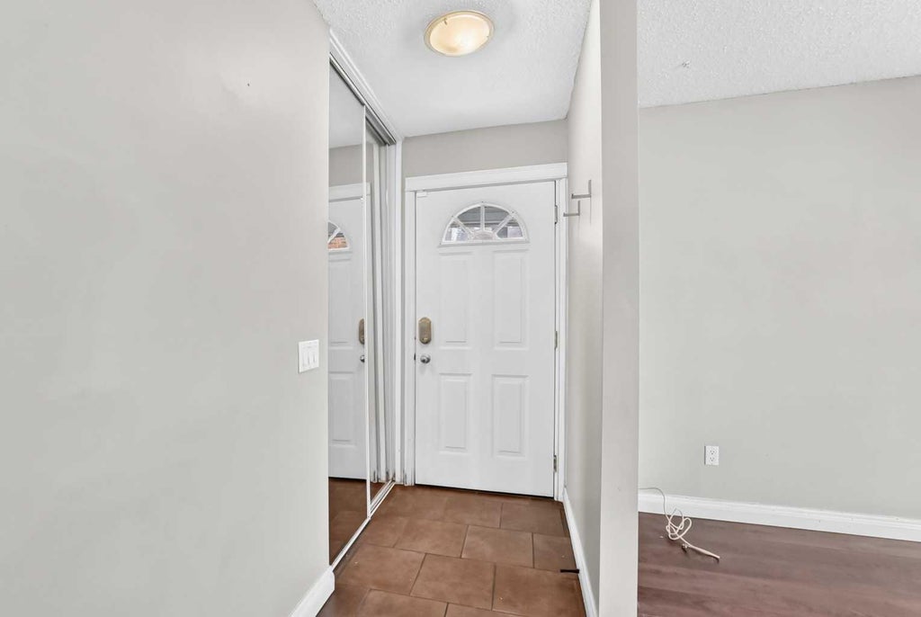 Photo of 512 Malvern Drive NE, Calgary, AB T2A 5J1 (MLS # A2343216)