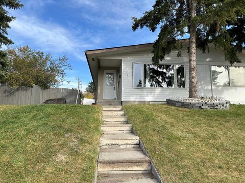Photo of 121 Huntford Close NE, Calgary, AB T2K 3Y7 (MLS # A2316029)