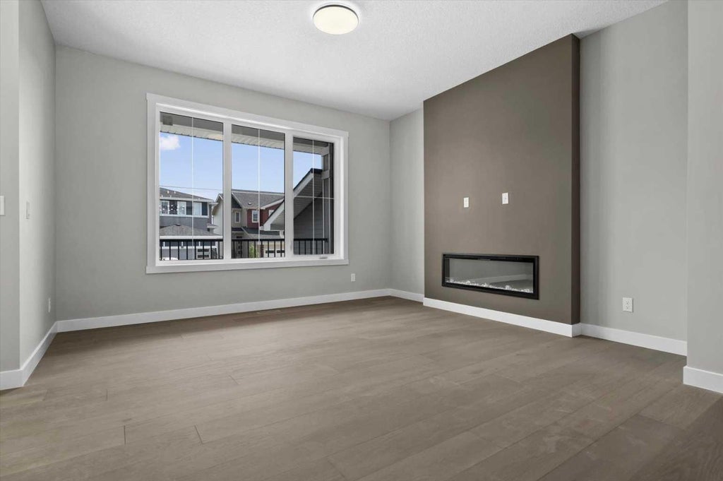 Photo of 55 Agate Road, Cochrane, AB T4C 3B9 (MLS # A2329006)