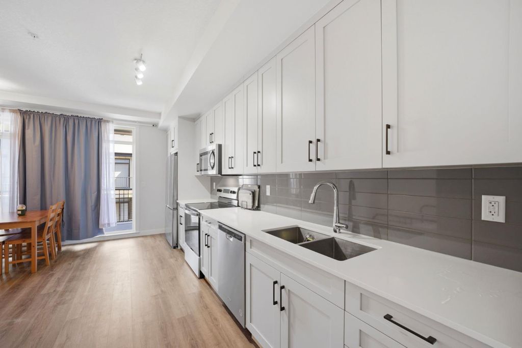 Photo of 10 Sage Hill Walk NW #315, Calgary, AB T3R 1X9 (MLS # A2301060)