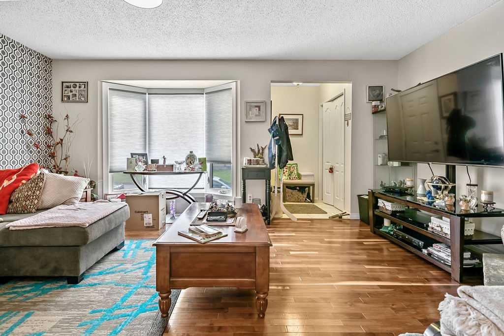 Photo of 6103 Madigan Drive NE #114, Calgary, AB T2A 5K9 (MLS # A2318396)