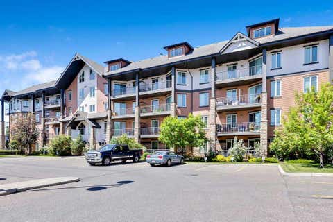 Photo of 15 Sunset Square #2110, Cochrane, AB T4C 0E7 (MLS # A2328598)