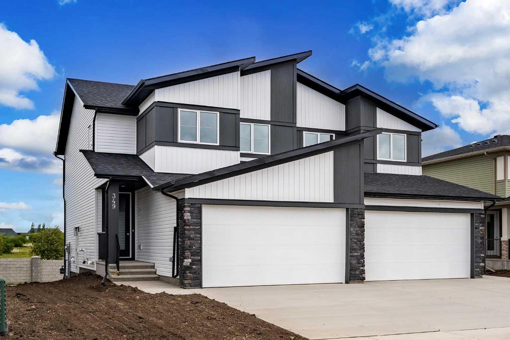 Photo of 349 Dawson Wharf Road, Chestermere, AB T1X 2W4 (MLS # A2321319)