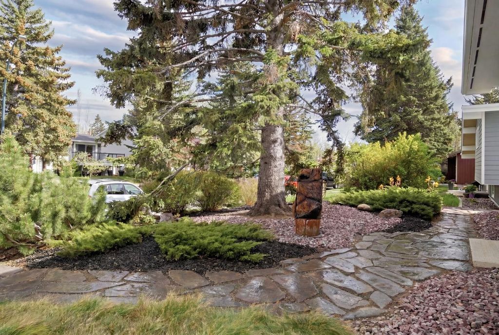 Photo of 10811 Maplecrest Road SE, Calgary, AB T2J 1Y1 (MLS # A2312136)