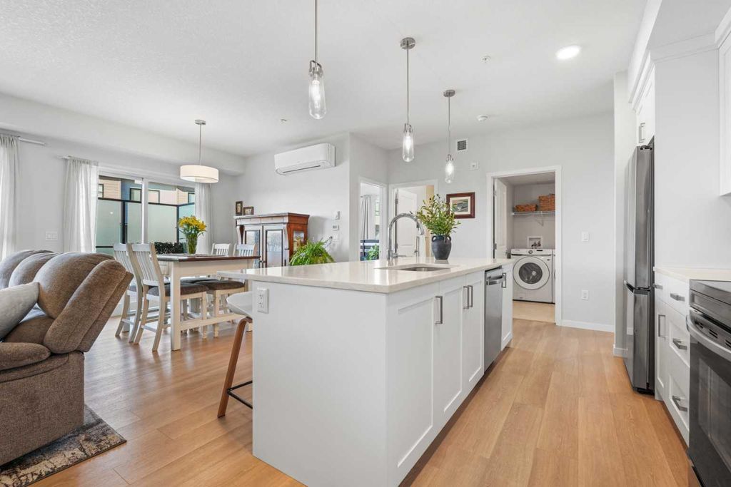 Photo of 42 Cranbrook Gardens SE #1203, Calgary, AB T3M 3P9 (MLS # A2288167)