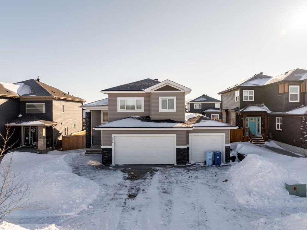 Photo of 404 Beacon Hill Drive, Fort McMurray, AB T9H 2R9 (MLS # A2295477)