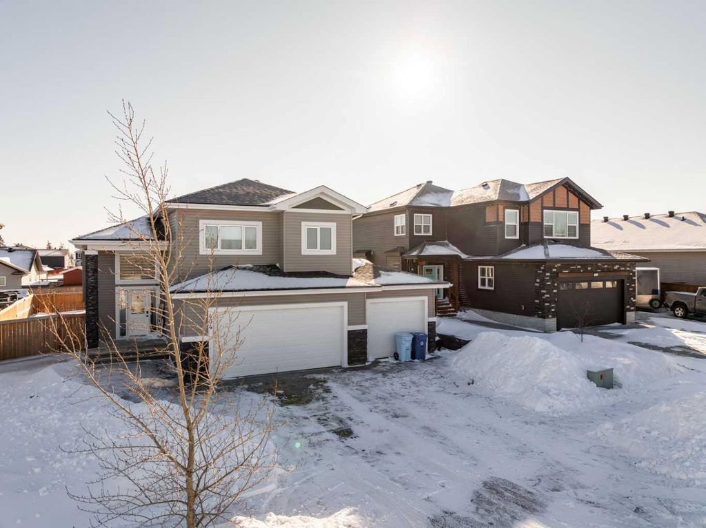 Photo of 404 Beacon Hill Drive, Fort McMurray, AB T9H 2R9 (MLS # A2295477)