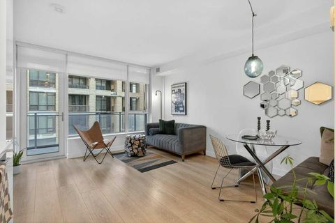 Photo of 108 Waterfront Court SW #503, Calgary, AB T2P 1K7 (MLS # A2311063)