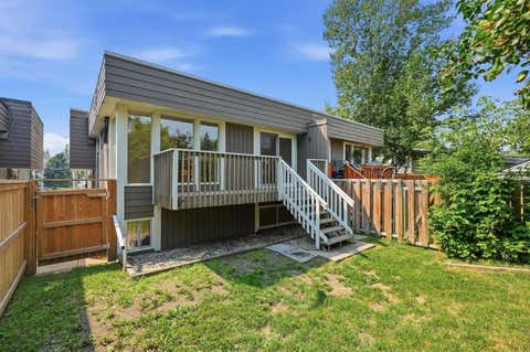 Photo of 126 McRae Street #4, Okotoks, AB T1S 1J4 (MLS # A2333771)