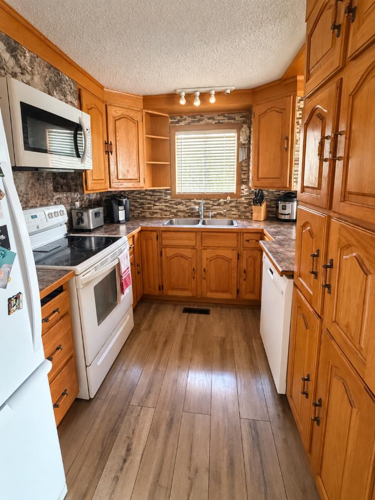 Photo of 128 Grandview Crescent, Fort McMurray, AB T9H 4X6 (MLS # A2348336)