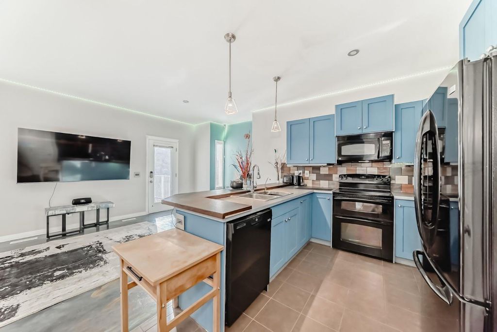 Photo of 51 Arbours Circle NW, Langdon, AB T0J 1X2 (MLS # A2266333)