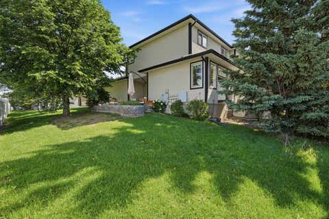 Photo of 15 Silver Springs Way NW #18, Airdrie, AB T4B 2W1 (MLS # A2331261)