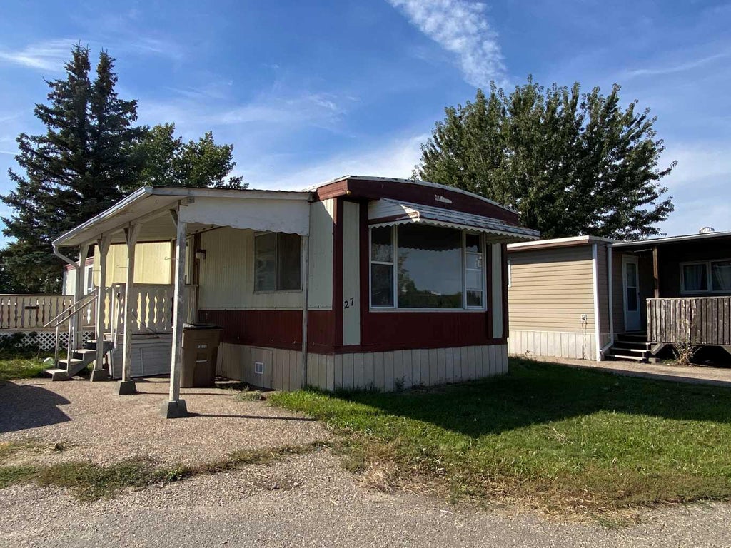 Photo of 27 LAKE STAFFORD Crescent E, Brooks, AB T1R 0P5 (MLS # A2348270)