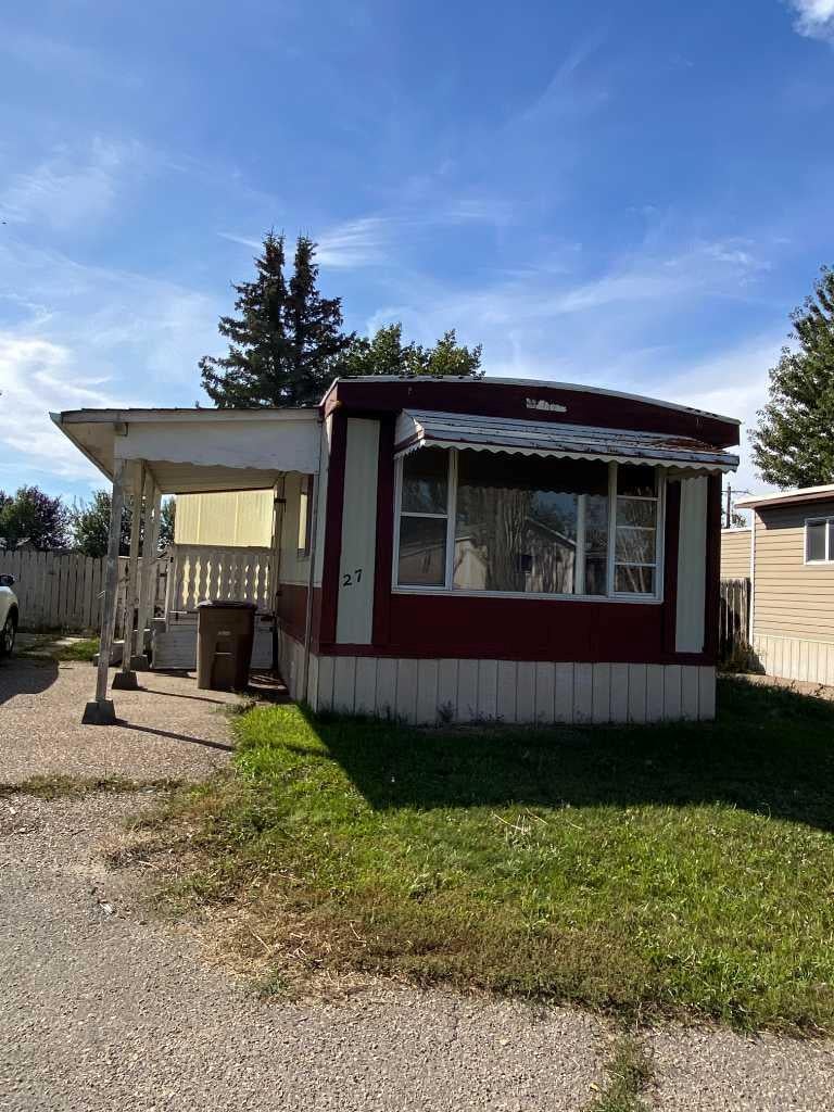 Photo of 27 LAKE STAFFORD Crescent E, Brooks, AB T1R 0P5 (MLS # A2348270)