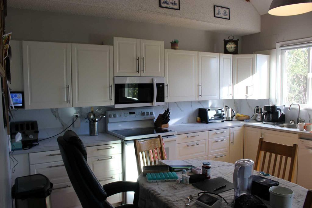 Photo of 556 Rogers Avenue, Picture Butte, AB T0K 1V0 (MLS # A2305842)