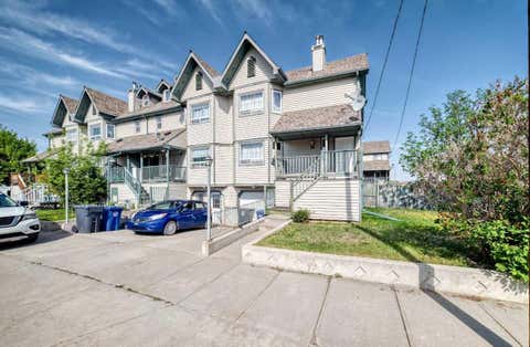 Photo of 401 6 Street #8, Beiseker, AB T0M 0G0 (MLS # A2314819)