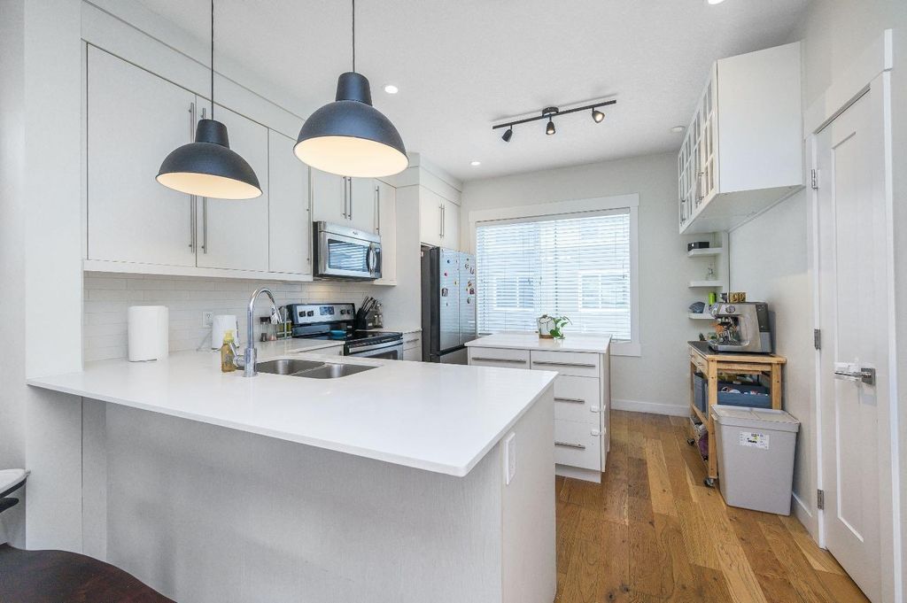 Photo of 111 Rainbow Falls Gate #59, Chestermere, AB T1X 0Z4 (MLS # A2289751)