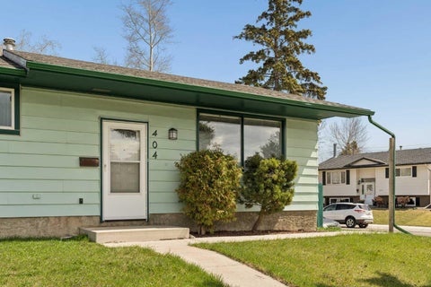 Photo of 404 Manora Way NE, Calgary, AB T2A 4R4 (MLS # A2303893)