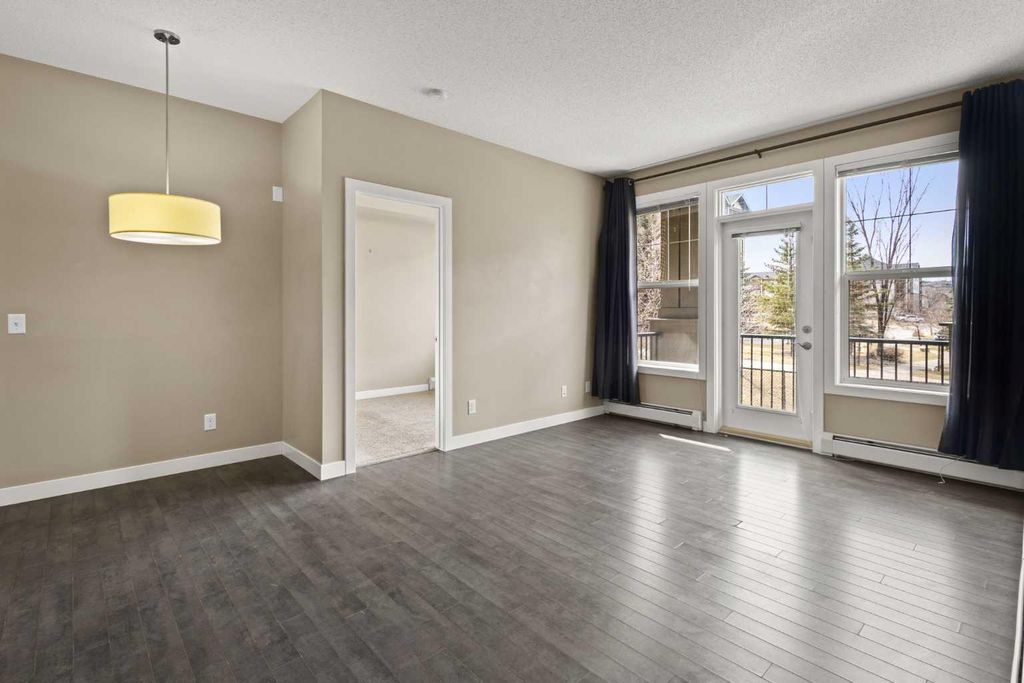 Photo of 48 Panatella Road NW #207, Calgary, AB T3K 0V4 (MLS # A2302195)