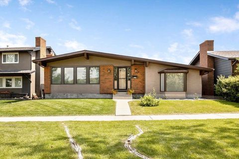 Photo of 1348 Norfolk Drive NW, Calgary, AB T2K 5P6 (MLS # A2328722)