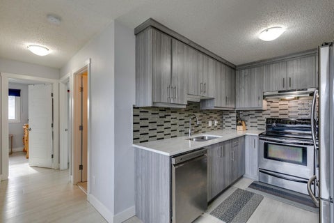 Photo of 140 Templehill Drive NE, Calgary, AB T1Y 4C3 (MLS # A2347869)