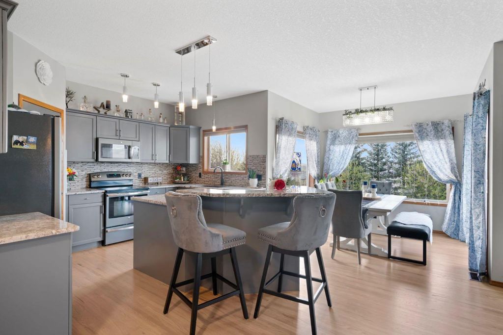 Photo of 16 Bow Ridge Drive, Cochrane, AB T4C 1V6 (MLS # A2310835)