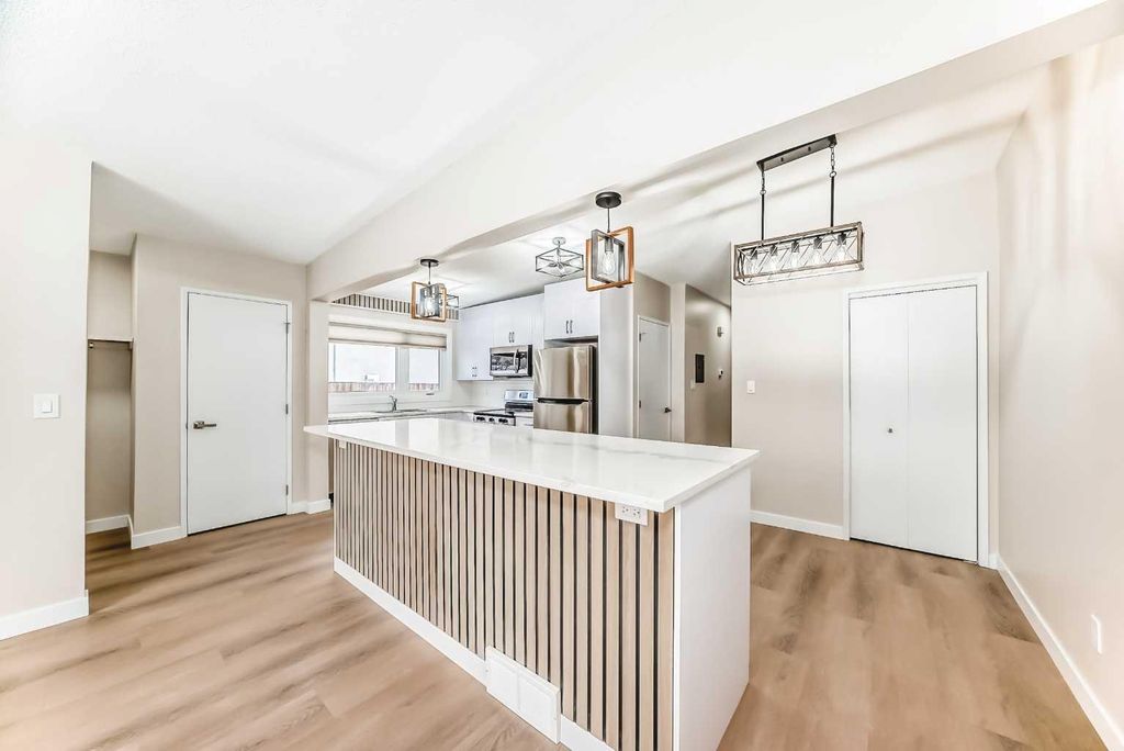 Photo of 7406-7408 Hunterfield Road NW, Calgary, AB T2K 4L1 (MLS # A2276447)