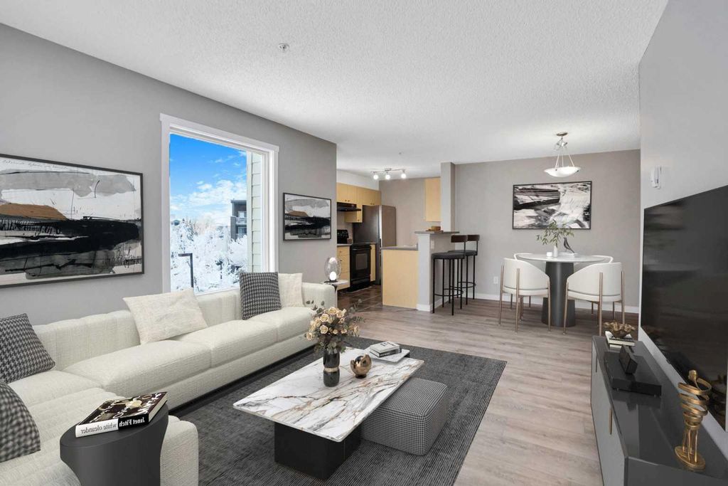 Photo of 304 Mackenzie Way SW #8302, Airdrie, AB T4B 3H6 (MLS # A2292420)