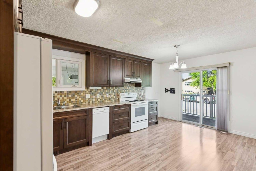 Photo of 918 38 Street SE, Calgary, AB T2A 1G2 (MLS # A2316163)