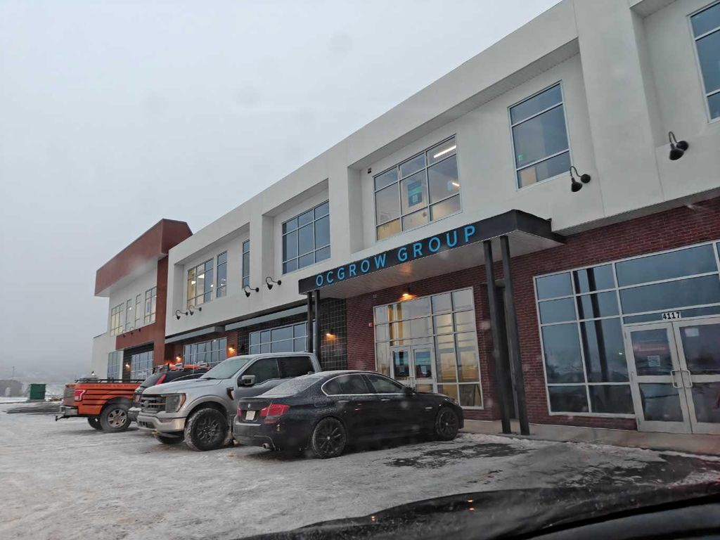 Photo of 422 Greystone Boulevard #4121, Cochrane, AB T4C 0A2 (MLS # A2316448)