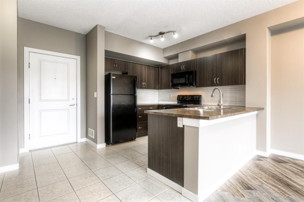 Photo of 100 Cranfield Common SE #208, Calgary, AB T3M 1S1 (MLS # A2296223)