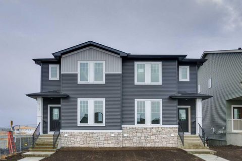 Photo of 221 Bridgeport Gate SW, Chestermere, AB T1X 3E2 (MLS # A2271891)