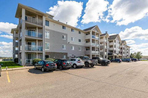 Photo of 1648 Saamis Drive NW #320, Medicine Hat, AB T1B 4X1 (MLS # A2345857)