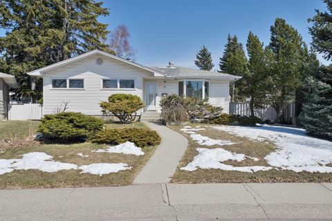 Photo of 48 Westover Drive SW, Calgary, AB T3C 2S4 (MLS # A2303369)
