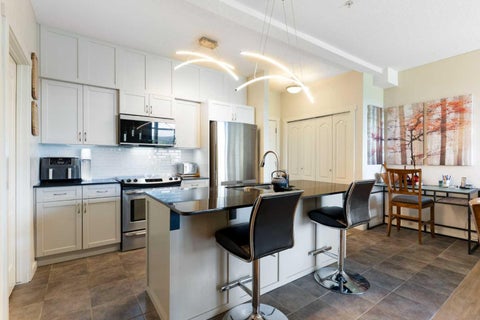 Photo of 141 Mountain Street #202, Cochrane, AB T4C 1Z5 (MLS # A2345237)